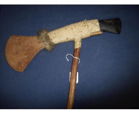 20th C Papa New Guinea adze axe with stone and wooden carved heads, with woven binding onto wooden shaft 