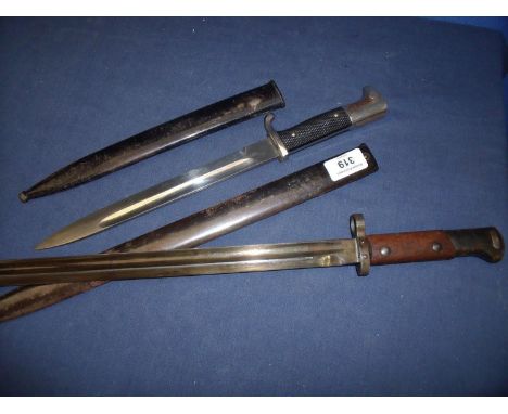 German parade bayonet by Puma Solingen with plated mounts and steel scabbard, and another circa WWI period bayonet (2) 