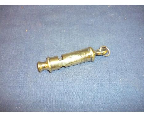 Brass military issue whistle stamped CNAA 1 9 8 1 with broad arrow mark date 1952 (A/F) 