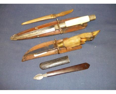 Deers foot Sheffield made sheath knife, a 19th C Fleam knife, a 5 1/2 inch bladed double edged dagger type knife with bone gr