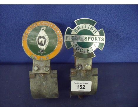 Two enamel sporting car badges with mounting brackets including British Field Sports Society and The Game Conservancy (2) 