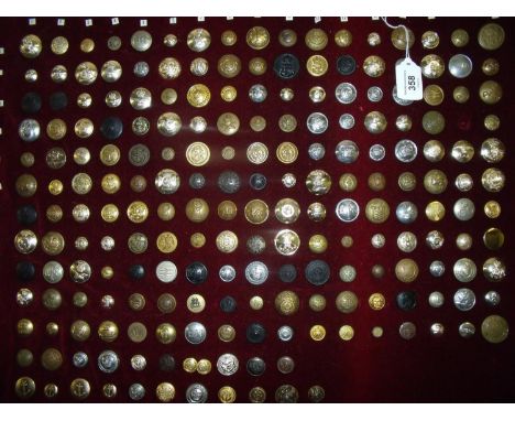 Board display mounted with large selection of various military and civil buttons including various examples brass Baker Light