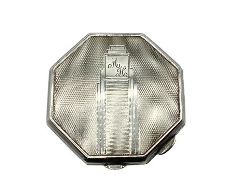 Av sterling silver compact, hexagonal form with engine turned decoration. Birmingham 1947. 67g 