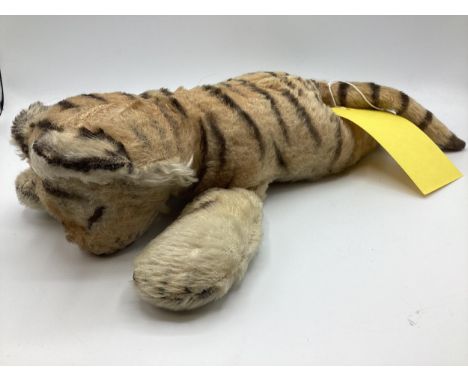 A Steiff Tiger soft toy, with button to ear, 40cm Long 