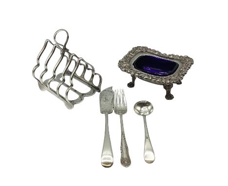 A sterling silver Elkington and Co toast rack together with a sterling silver fork, a plated salt and other plated items. 