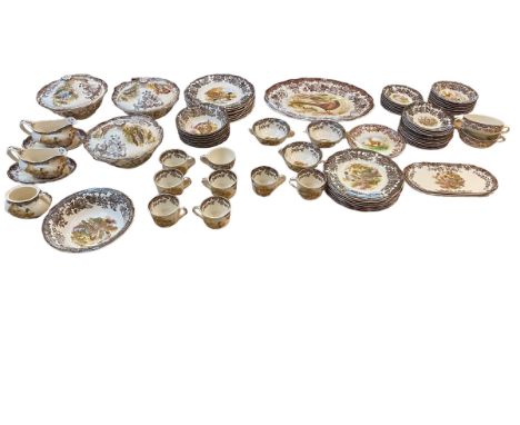 A Royal Worcester part dining service 'Palissy Game series' to include 8 dinner plates, 7 desert plates, 7 desert bowls , 7 b