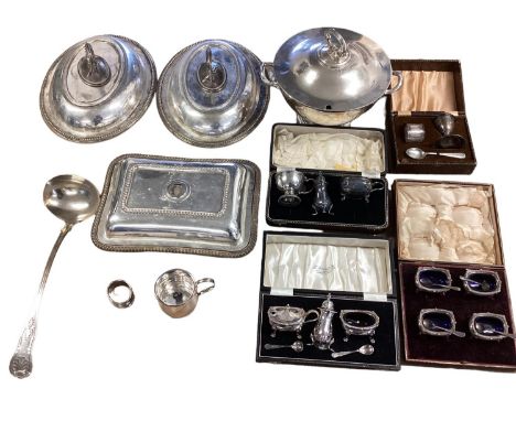 A collection of silver plated wares to include lidded terrine and ladle, boxed items and oval covered dishes 