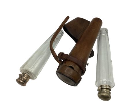 Ladies tan leather hunting saddle flask with two conical glass flask