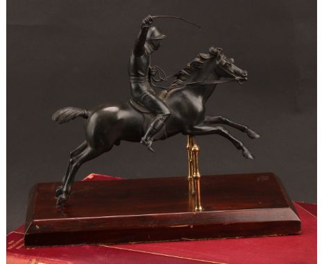 French School (early 20th century), a dark patinated bronze, of a horse and jockey clearing a fence, rectangular mahogany bas