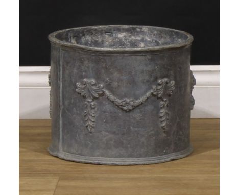 A 19th century lead garden planter, applied with a recumbent lion and Neoclassical swags, 25cm high, 30.5cm diameter