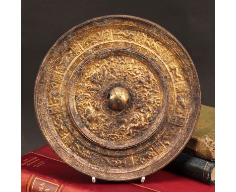 A Chinese gilt bronze circular mirror, cast with a border of zodiac animals, 21.5cm diameter