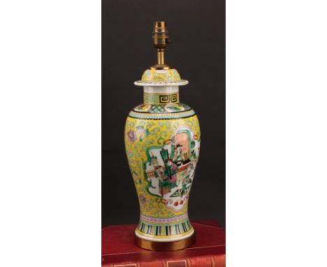 A Chinese baluster vase, painted in polychrome enamels with warriors on a yellow ground, mounted as a table lamp, 36cm to bas