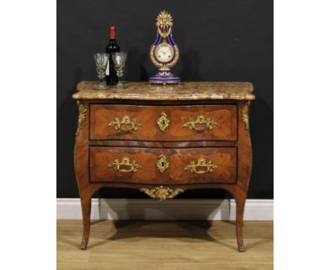 A 19th century French Louis XV Revival gilt metal mounted kingwood serpentine commode, marble top above two long drawers, 80c