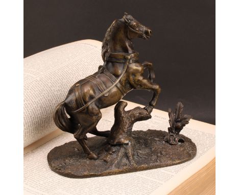 A 19th century Continental bronze, of a bolting stallion rampant, the base cast with flora, 18cm high overall