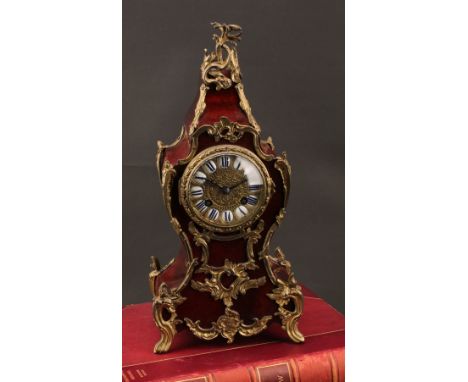 A Louis XV Revival gilt metal and simulated tortoiseshell mounted mantel clock, 8.5cm dial applied with Roman numerals, twin 