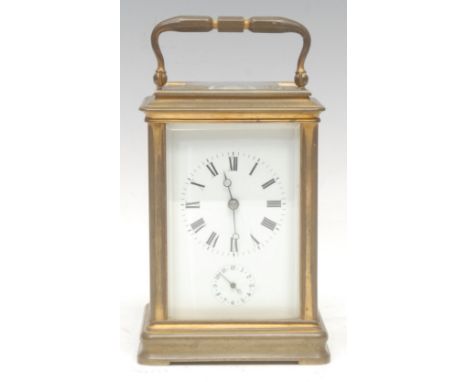 An early 20th century gilt brass alarum carriage clock, 6.5cm rectangular enamel dial inscribed with Roman numerals, Arabic a