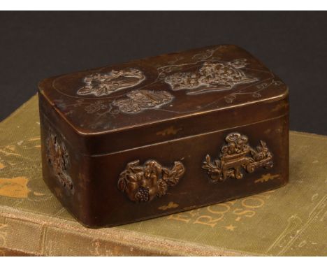 A Japanese brown patinated bronze rounded rectangular box, applied with 'menuki' depicting a mouse on a persimmon, and other 