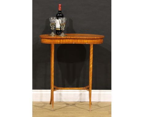 A Sheraton Revival satinwood kidney shaped lamp or occasional table, slightly oversailing top, tapered legs, shaped and pierc
