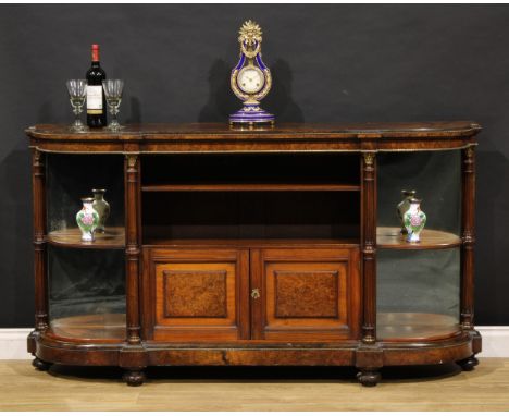 A late Victorian gilt metal mounted walnut open credenza or library side cabinet, slightly oversailing top above an adjustabl