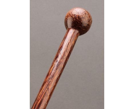 A Colonial palmwood walking stick or cane, of knobkerrie form, 86.5cm long, late 19th/early 20th century