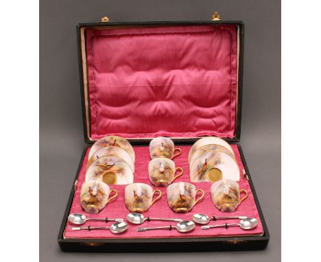 A set of six Royal Worcester coffee cups and saucers, painted by James Stinton, signed, with pheasants in a woodland clearing