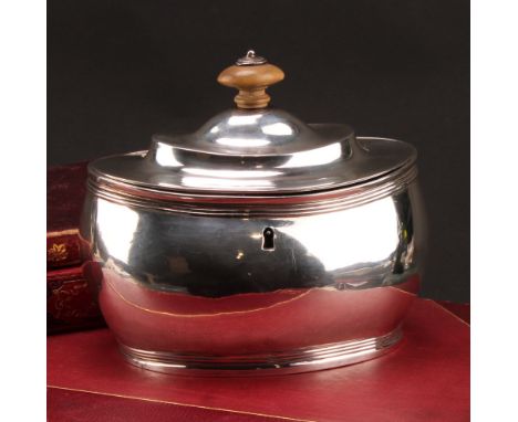 A George III silver oval tea caddy, quite plain, hinged domed cover with fruitwood finial, reeded borders, 15cm wide, Charles
