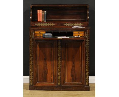 A Regency rosewood and brass marquetry library secretaire chiffonier, the open bookcase superstructure with a pair of drawers
