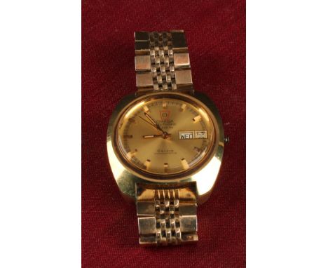 A gentleman's Omega Electronic gold plated stainless steel chronometer, 300Hz, gold dial, baton indicators, day/date aperture