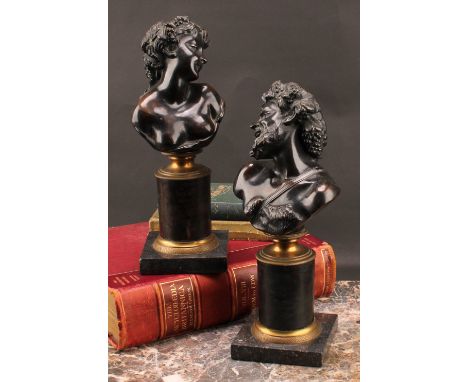 French School (19th century) a pair of brown patinated bronze library busts, Bacchus and Baccante, columnar bases, 32cm high,