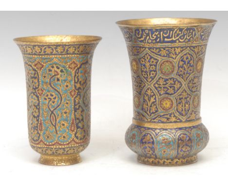 A Kashmiri enamel flared cylindrical beaker, decorated in the Persian Islamic taste with stylised lotus and Arabic calligraph