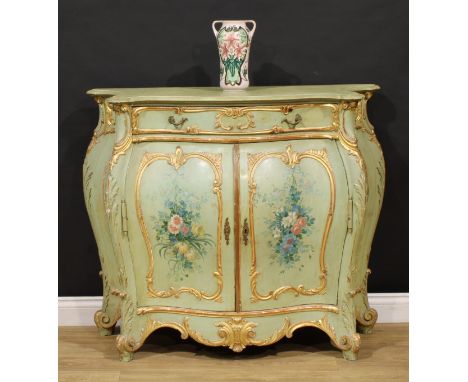 An Italian painted and parcel-gilt serpentine side cabinet, possibly Venetian, oversailing top above a long frieze drawer and