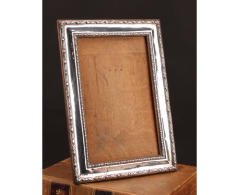 A large George V silver rectangular easel photograph frame, 34cm high, Birmingham 1911