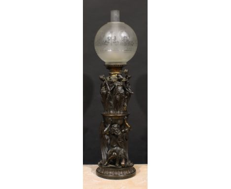 A substantial 19th century Renaissance Revival dark patinated bronze table oil lamp, cast with the kneeling Chronos beneath a