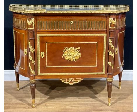 A Louis XVI Revival gilt metal mounted mahogany secretaire cabinet, in the manner of Henry Dasson, marble top above a fitted 