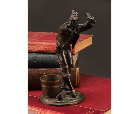 A 19th century Bronze figure, Blindman's Buff, modelled as a blind folded man reaching out a coopered pail bucket and broom a