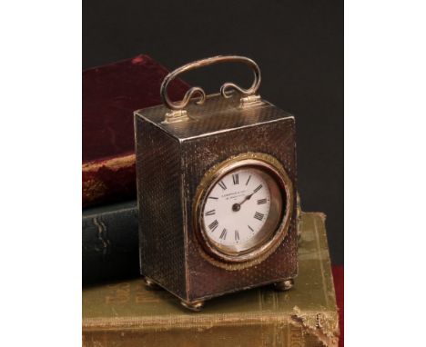 An Edwardian silver miniature carriage timepiece, 3.5cm circular enamel clock dial inscribed Edwards &amp; Sons, Roman numera
