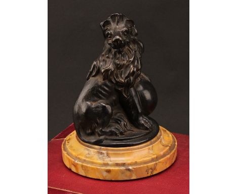 Continental School (19th century), a dark patinated bronze, of a lion, his paw raised upon an orb, turned Sienna marble base,