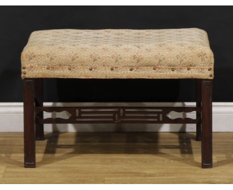 A Chippendale Revival mahogany stool, stuffed-over seat, square legs, pierced H-stretcher, 44cm high, 69cm wide, 52cm deep, c