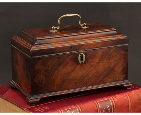 A George II/early George III mahogany tea caddy, hinged pagoda top enclosing three compartments and a spoon tray, brass swan 
