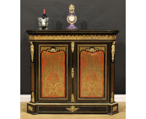 A Louis XV Revival gilt metal mounted, ebonised and premier and contra-partie brass marquetry enclosed pier cabinet, in the m