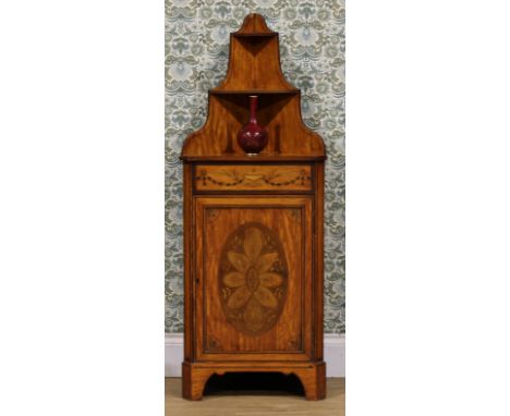 A Sheraton Revival satinwood and marquetry floor-standing corner cabinet, shaped gallery with a waterfall arrangement of shel