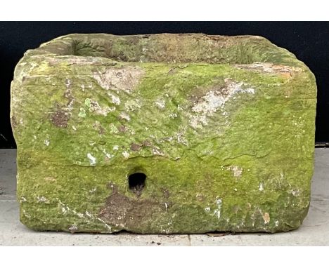A stone garden trough, 29cm high, 49cm wide, 48cm deep