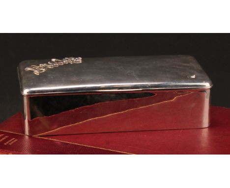 An early 20th century silver rounded rectangular Bridge box, hinged cover enclosing provision for playing cards, 21cm wide, m