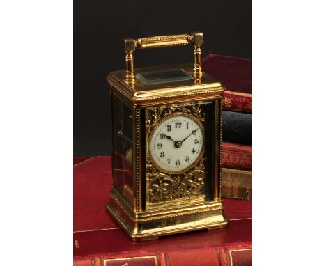 A 19th century French lacquered brass carriage clock, 4.5cm enamel dial inscribed with Arabic numerals, within a ground appli