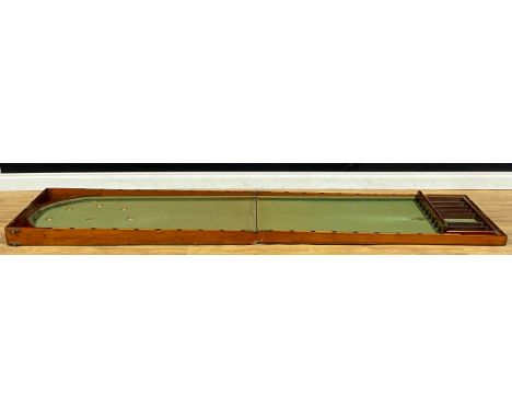 An Edwardian mahogany folding bagatelle table, opening to 273.5cm long, 70.5cm wide, c.1905