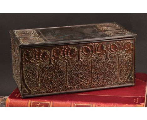 An Arts &amp; Crafts copper mounted rectangular caddy, decorated in relief in the Art Nouveau manner with sinuous trees and l