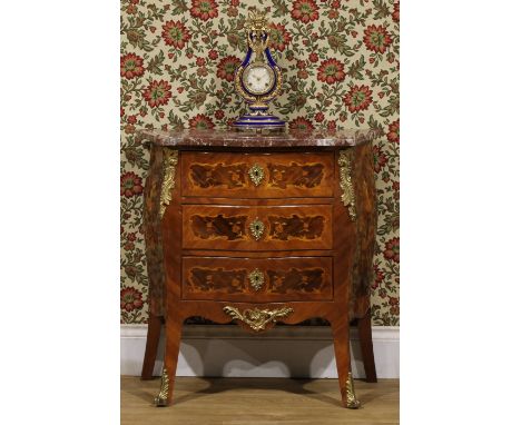 A Louis XV Revival gilt metal mounted walnut, kingwood and marquetry serpentine commode, marble top above three long drawers,