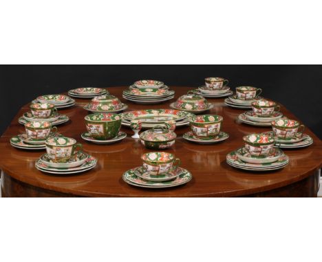 A 19th century Staffordshire Ironstone Chinoiserie pattern part dinner service, decorated in tones of green and red, picked o