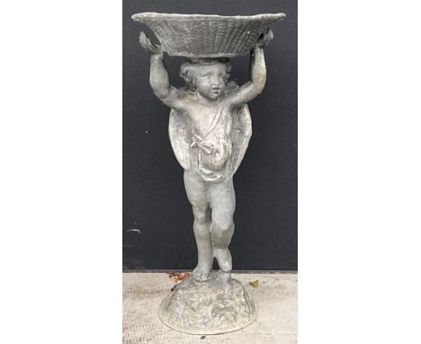 A 19th century lead figural bird bath, the bowl drilled for a fountain, 74cm high, the bowl 36cm wide and 29cm deep