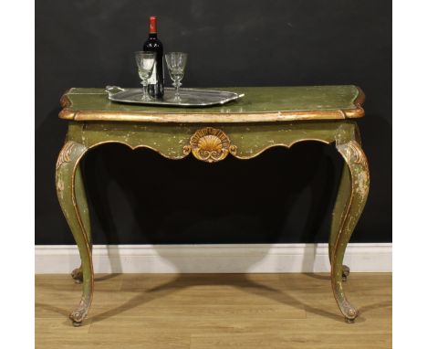 A 19th century Italian parcel-gilt and green painted pier table, possibly Venetian, serpentine top, the frieze carved with sh